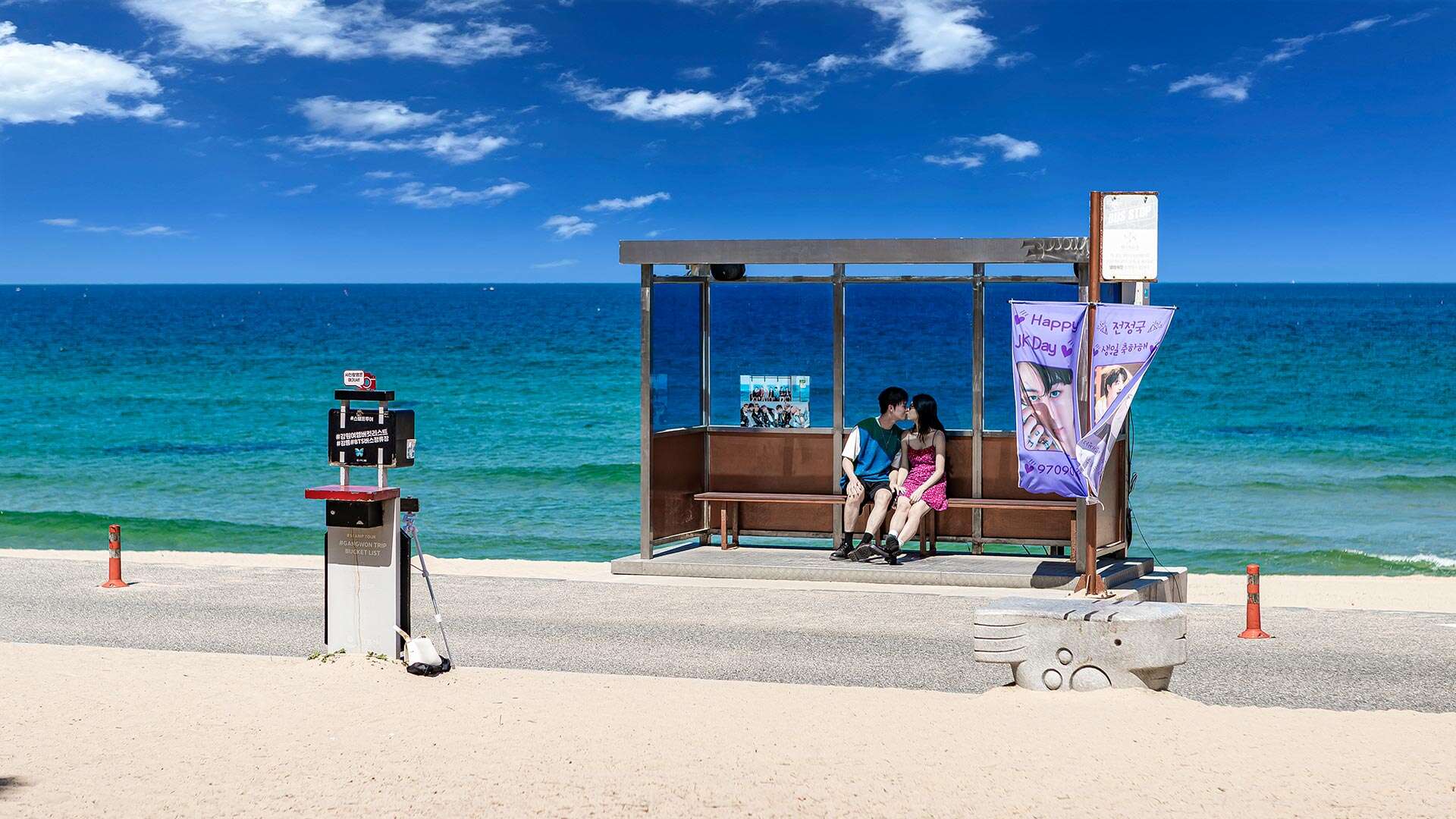 People enjoying the BTS bus stop photo zone 01