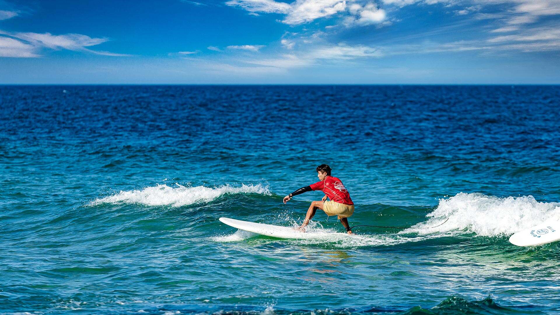 People enjoying surfing in the sea 08